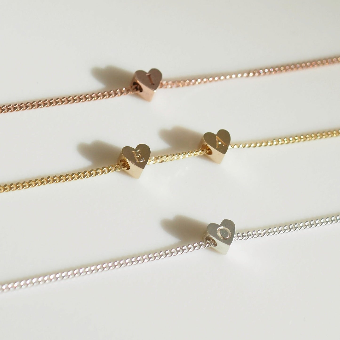[text overlay: Rose Gold (top), Yellow Gold (middle) and Silver (Bottom) Engravable Charms]