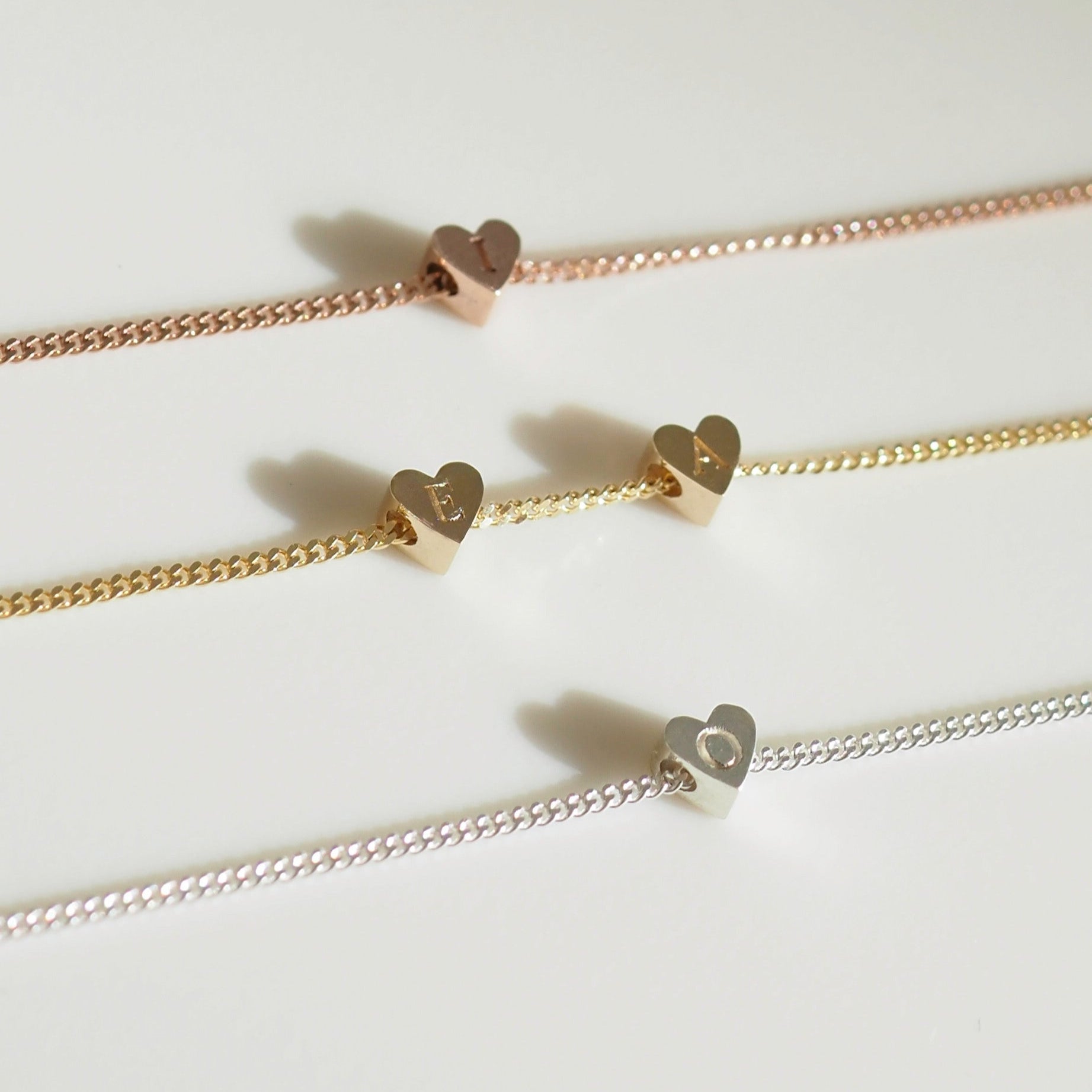 [text overlay: Rose Gold (top), Yellow Gold (middle) and Silver (Bottom) Engravable Charms]