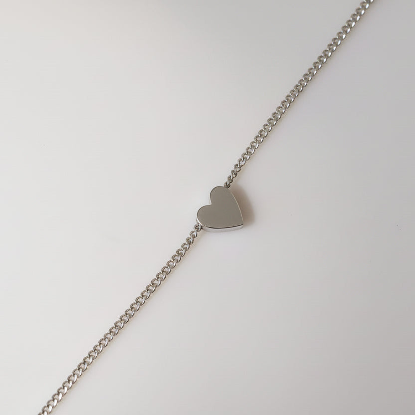 Small heart charm on chain