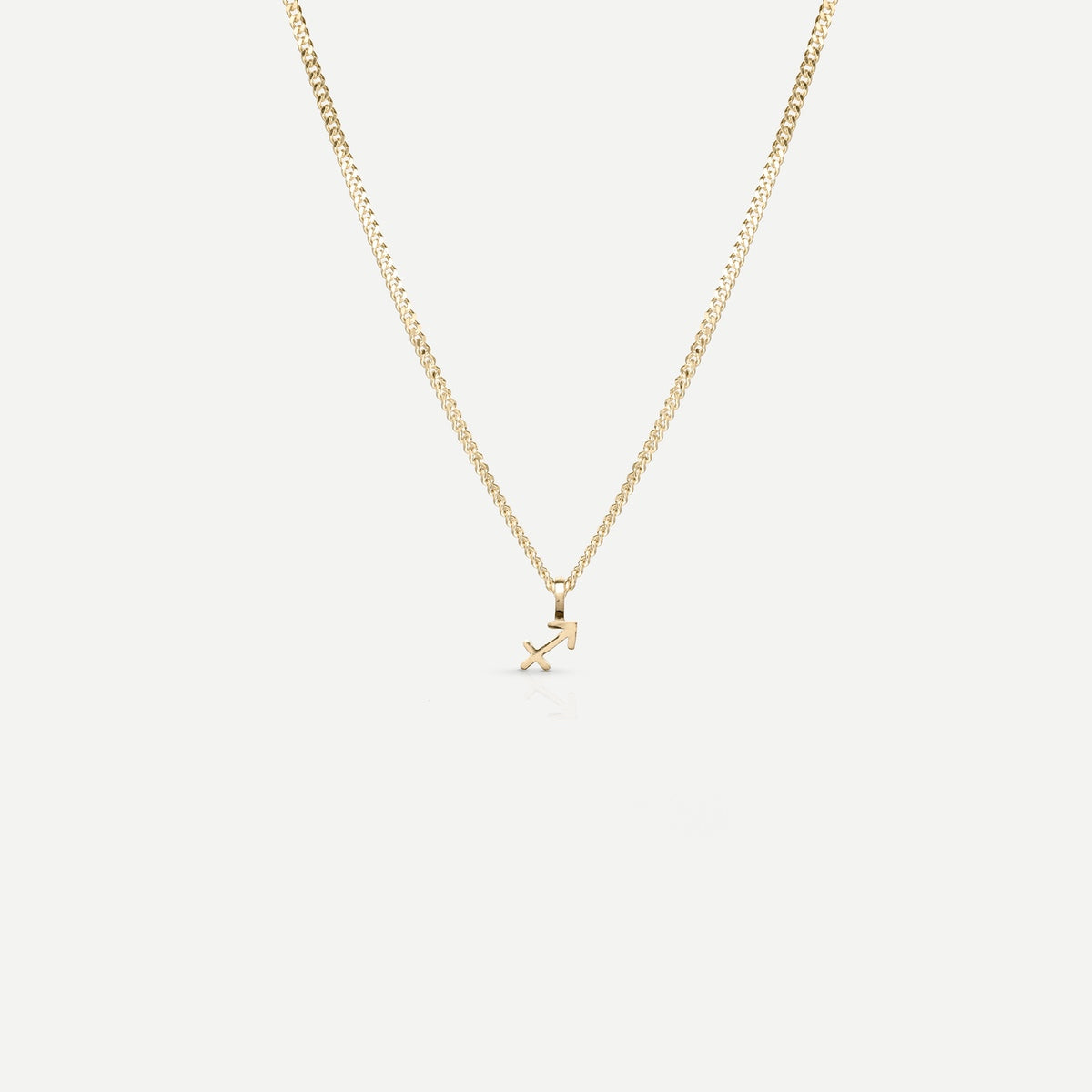 Solid gold and silver jewellery: A single Kate & Kole hand finished zodiac necklace in 9ct yellow gold[text overlay: Sagittarius] [text colour: #000000]
